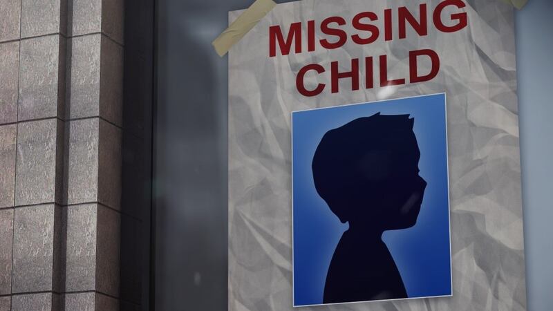 FILE -- Missing child poster.