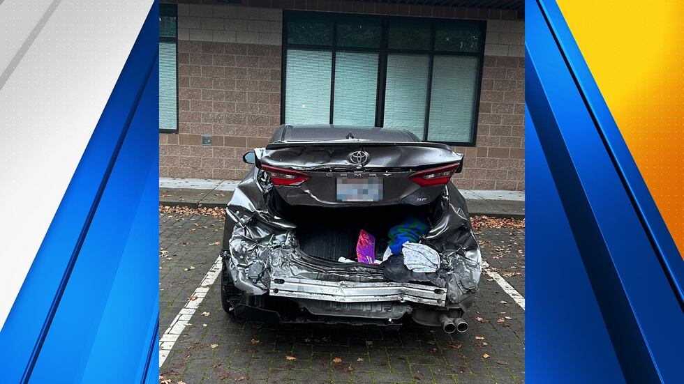 Police say a man repeatedly rammed a rideshare vehicle carrying his wife, causing severe...