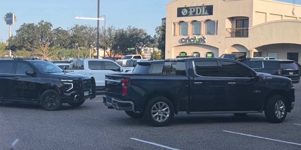 Police serve search warrants at McPherson Plaza shopping center